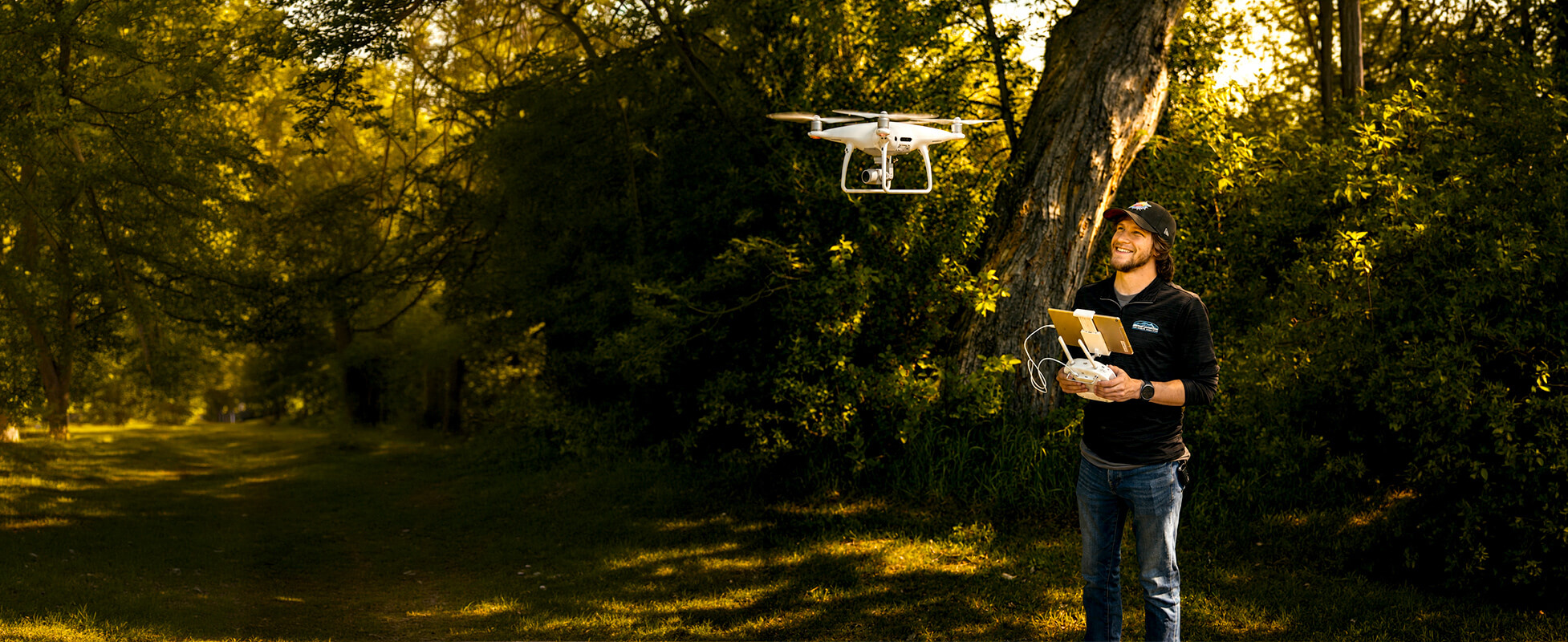 Man operating drone for GIS